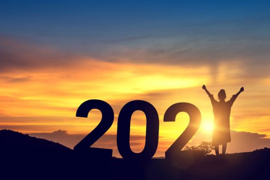 Woman as "1" in 2021 on mountaintop